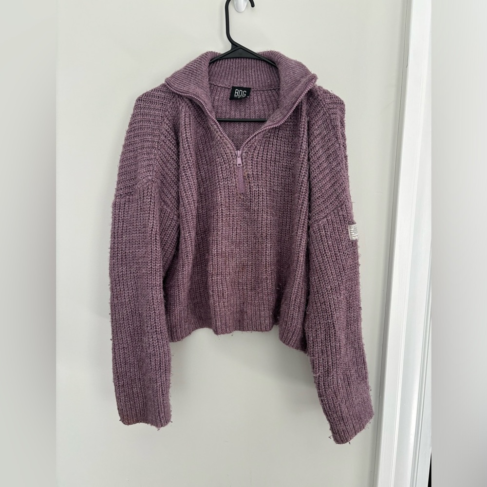 Women’s knit purple quarterzip.